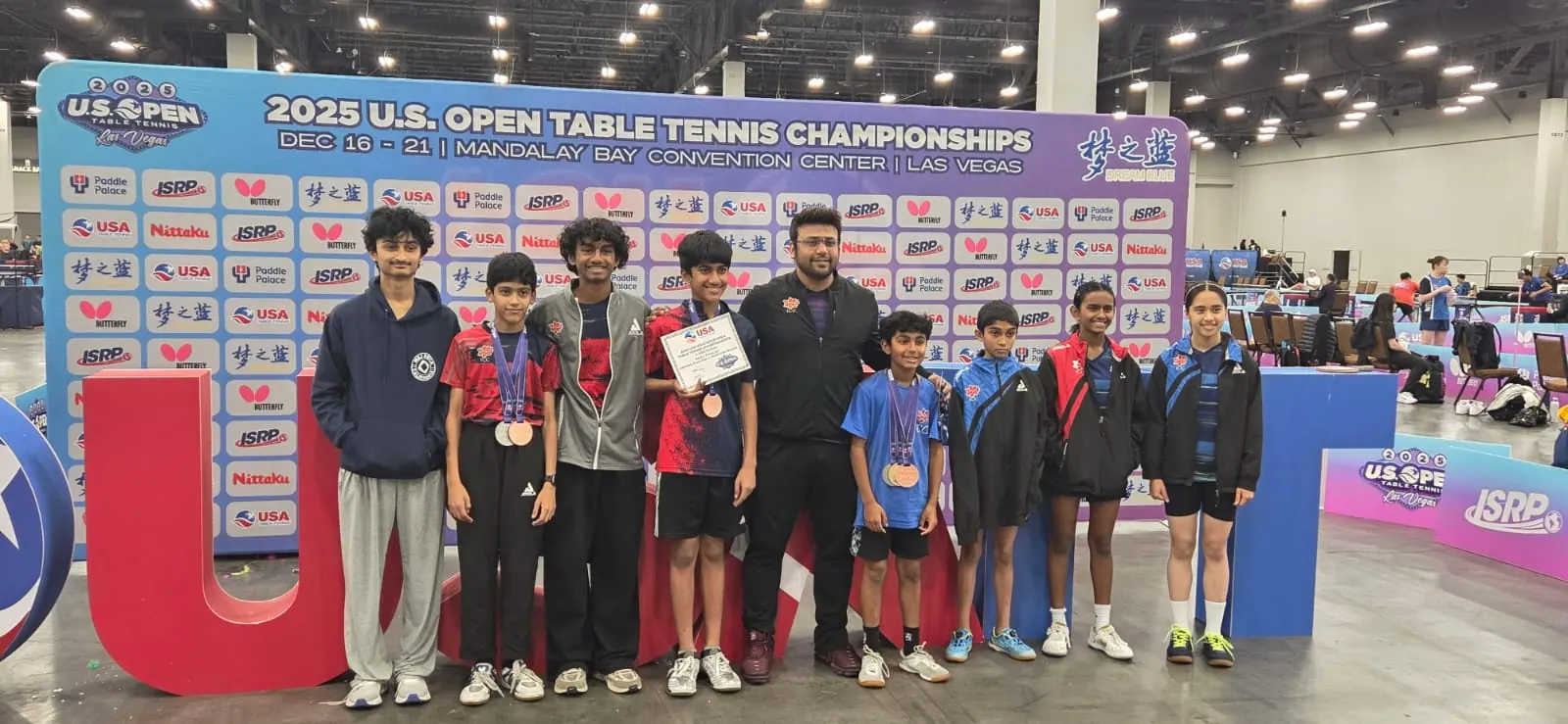 Subham Kundu with the ICC squad and their medals at the 2025 US Open Table Tennis Championships in Las Vegas