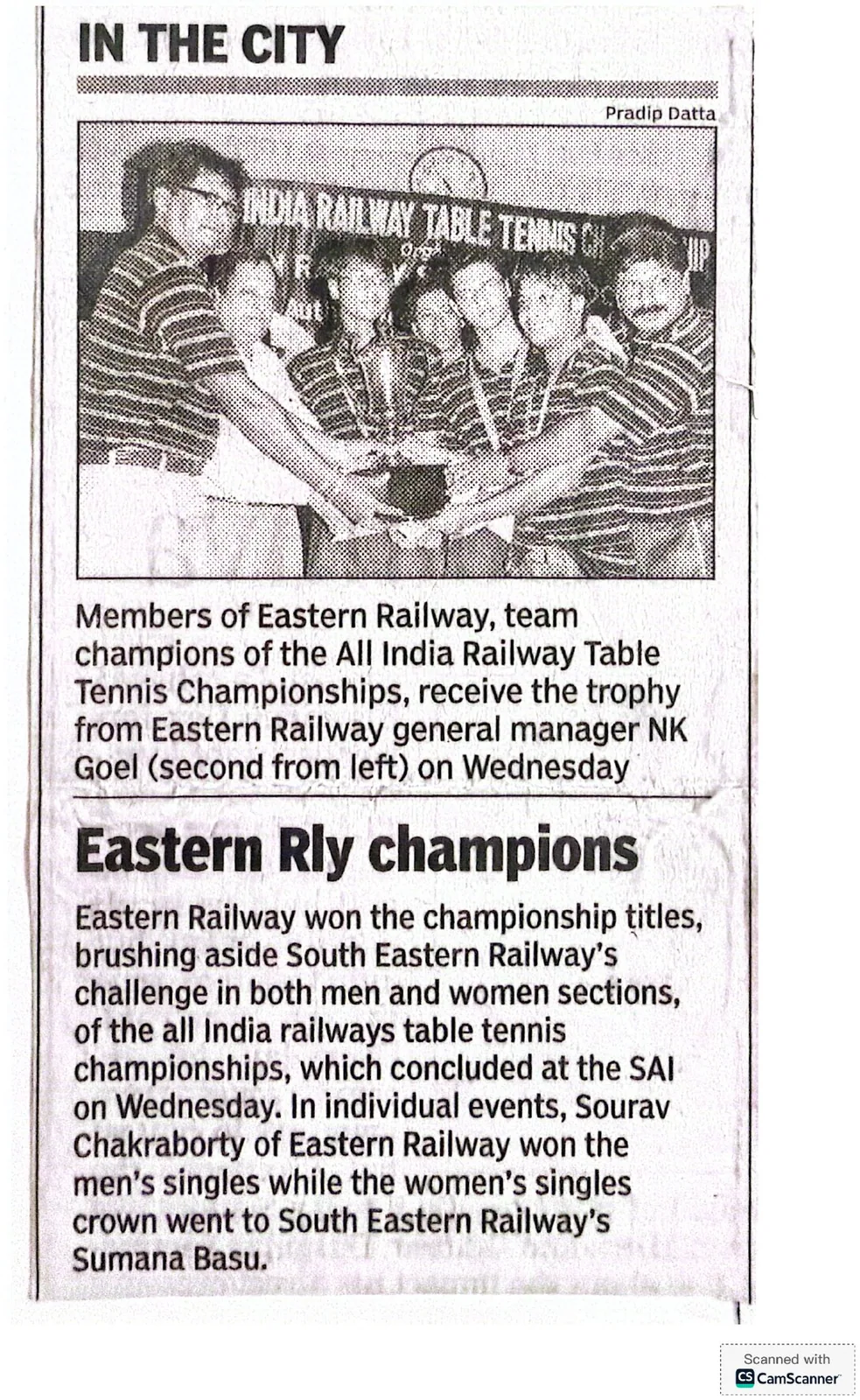 Newspaper clipping: Eastern Railway, team champions of the All India Railway Table Tennis Championships, receive the trophy